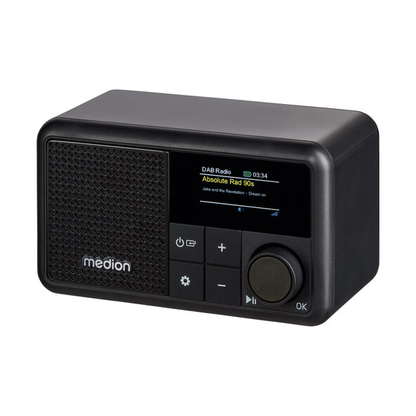 Schwarzes, kompaktes DAB+ Radio mit kleinem Display und wenigen Bedienelementen auf einer hellen Fläche fotografiert.
