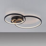 Schwarze, runde LED-Deckenleuchte ASMINA mit einem flachen, geometrischen Design. Das Licht scheint diffus und gleichmäßig. Der Hintergrund ist neutral weiß.
