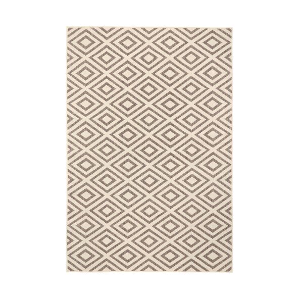 Ein rechteckiger Outdoor-Teppich mit einem geometrischen Muster in Grau- und Beigetönen liegt auf einem hellen Untergrund. Er wirkt robust und modern.
