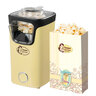 Gelbe Popcornmaschine mit transparentem Behälter und Retro-Design, freigestellt vor weißem Hintergrund.