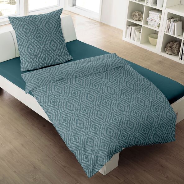 Bettwäsche Jacquard-Feinbiber mit Rautenmuster in Petrol und Grün, bestehend aus einem Bettbezug und einem Kissenbezug.