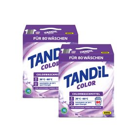 Zwei große, weiße Plastikbeutel Colorwaschmittel mit blauen und grünen Designelementen. Der Produktname "Colorwaschmittel" ist deutlich aufgedruckt.