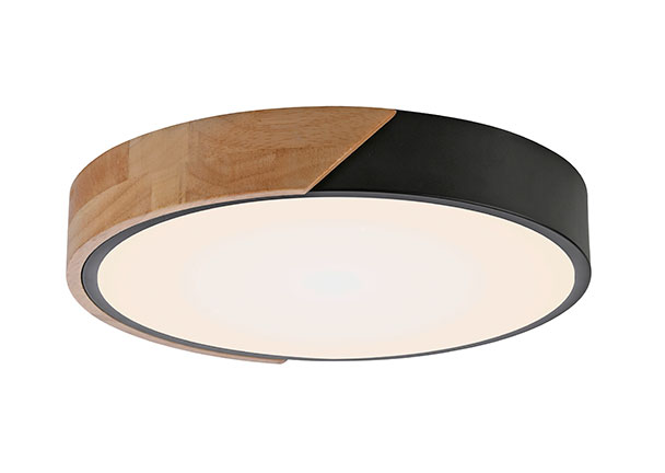 Schwarze, runde LED-Deckenleuchte BILA mit gleichmäßigem, hellem Lichtschein vor neutralem Hintergrund. Die Leuchte wirkt flach und modern.