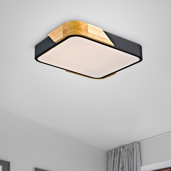 Schwarze, quadratische LED-Deckenleuchte BILA mit abgerundeten Ecken, die ein helles, gleichmäßiges Licht abstrahlt und modern anmutet.