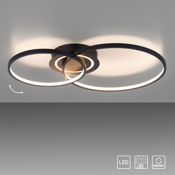 Schwarze LED-Deckenleuchte ASMINA mit runder Form. Die Leuchte ist flach und scheint direkt an der Decke montiert zu sein.